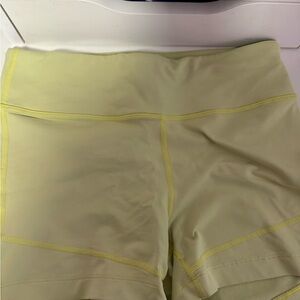 Outdoor Voices Women’s High-Waist Athletic Shorts in Pale Yellow